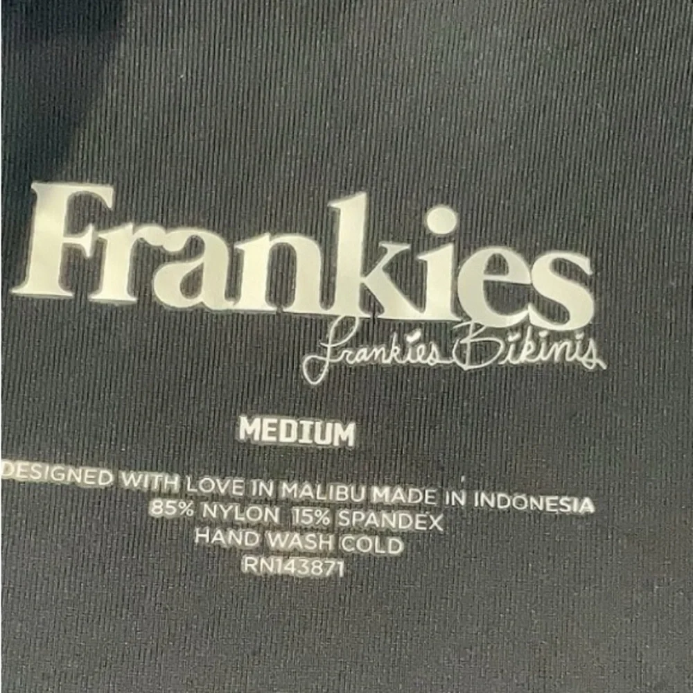 Frankie’s bikini sz medium. Monokini one piece w/cutouts. Adjustable coverage